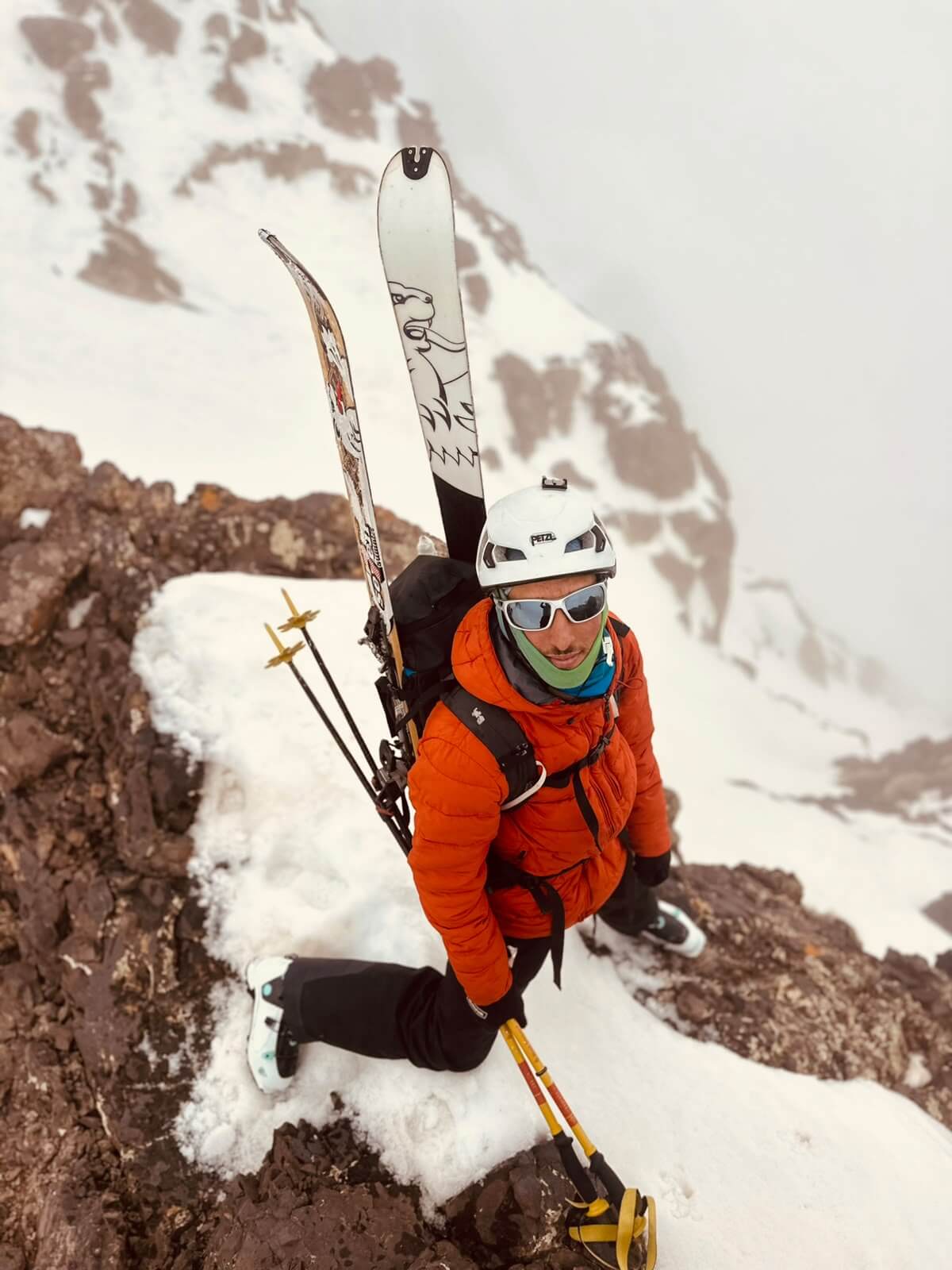Radouane above a mountain couloir