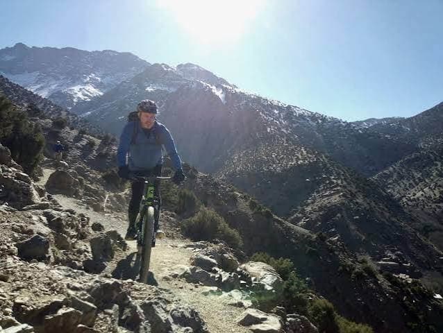 Mountain biker riding a singletrack in Morocco’s Happy Valley